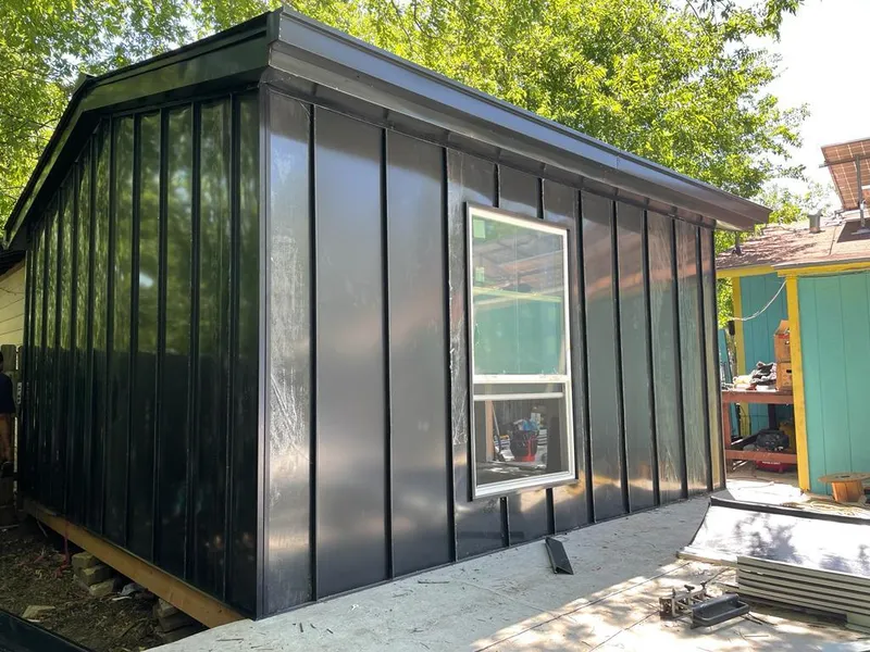 Black standing seam metal wall panels for Metal Roof Installation in Sherman