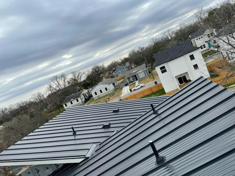 Standing seam metal roof panels with vents for Skylight Repair in Sherman